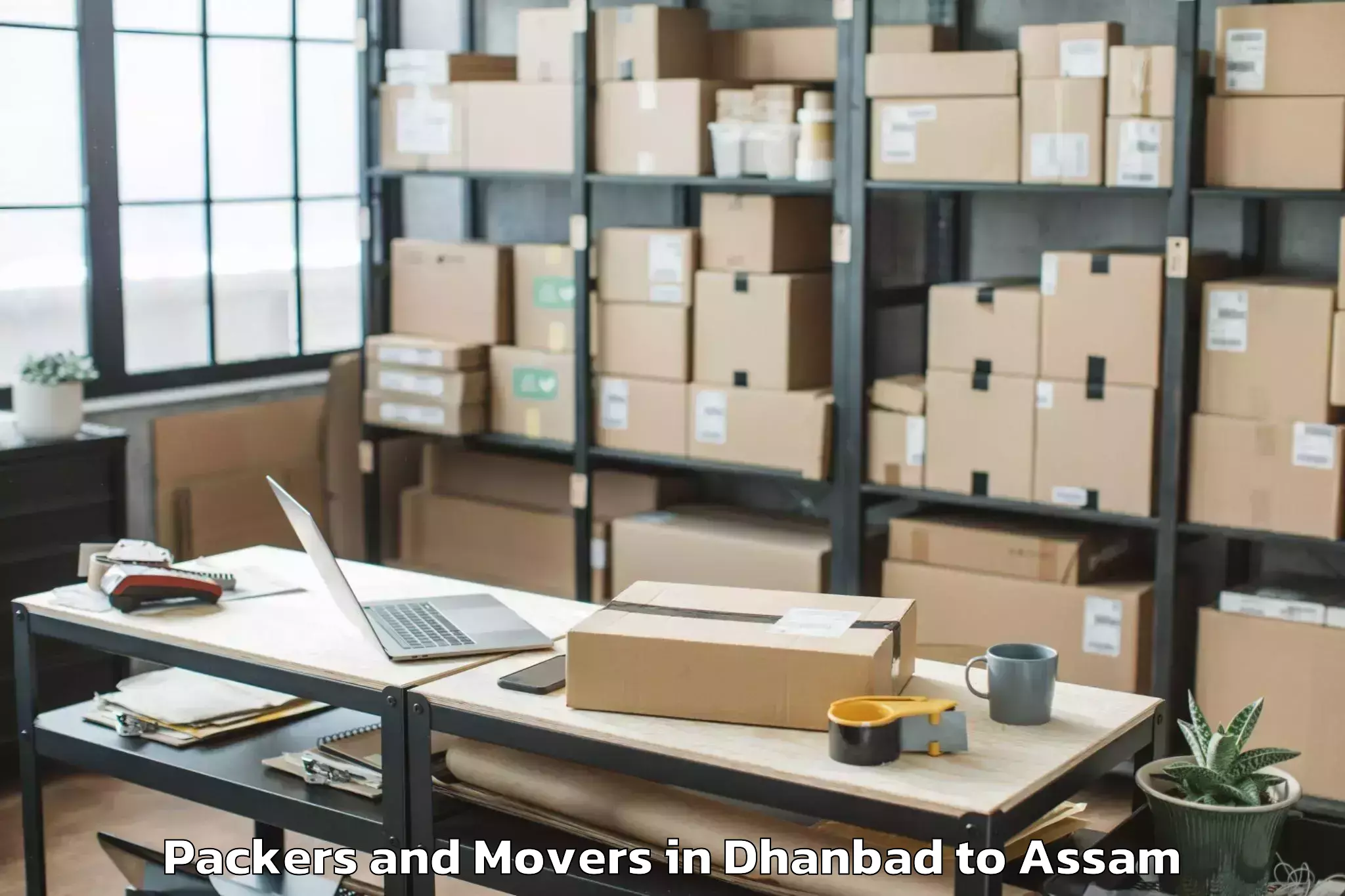 Easy Dhanbad to Laharighat Packers And Movers Booking